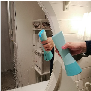 Tersano i-clean mini product being sprayed on mirror