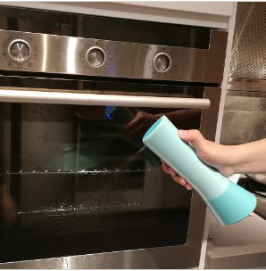 Tersano i-clean mini product being sprayed on stove